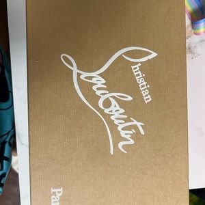 Red bottom woman heels